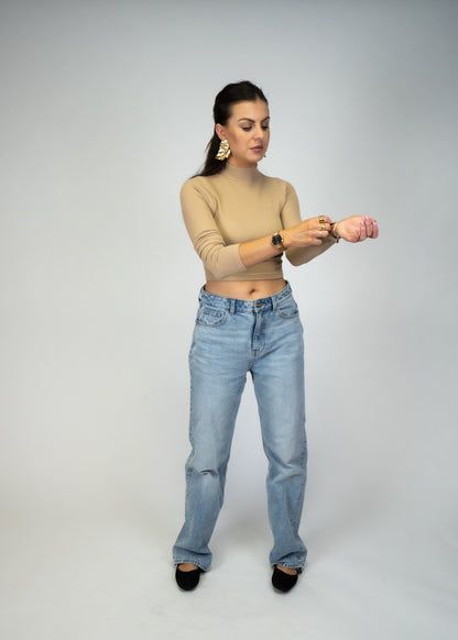This knit seamless ribbed long sleeve turtle neck is a classic must-have, crafted from a blend of 92% nylon and 8% spandex for a contemporary fit.  Shop today for a Boho Chic and trendy