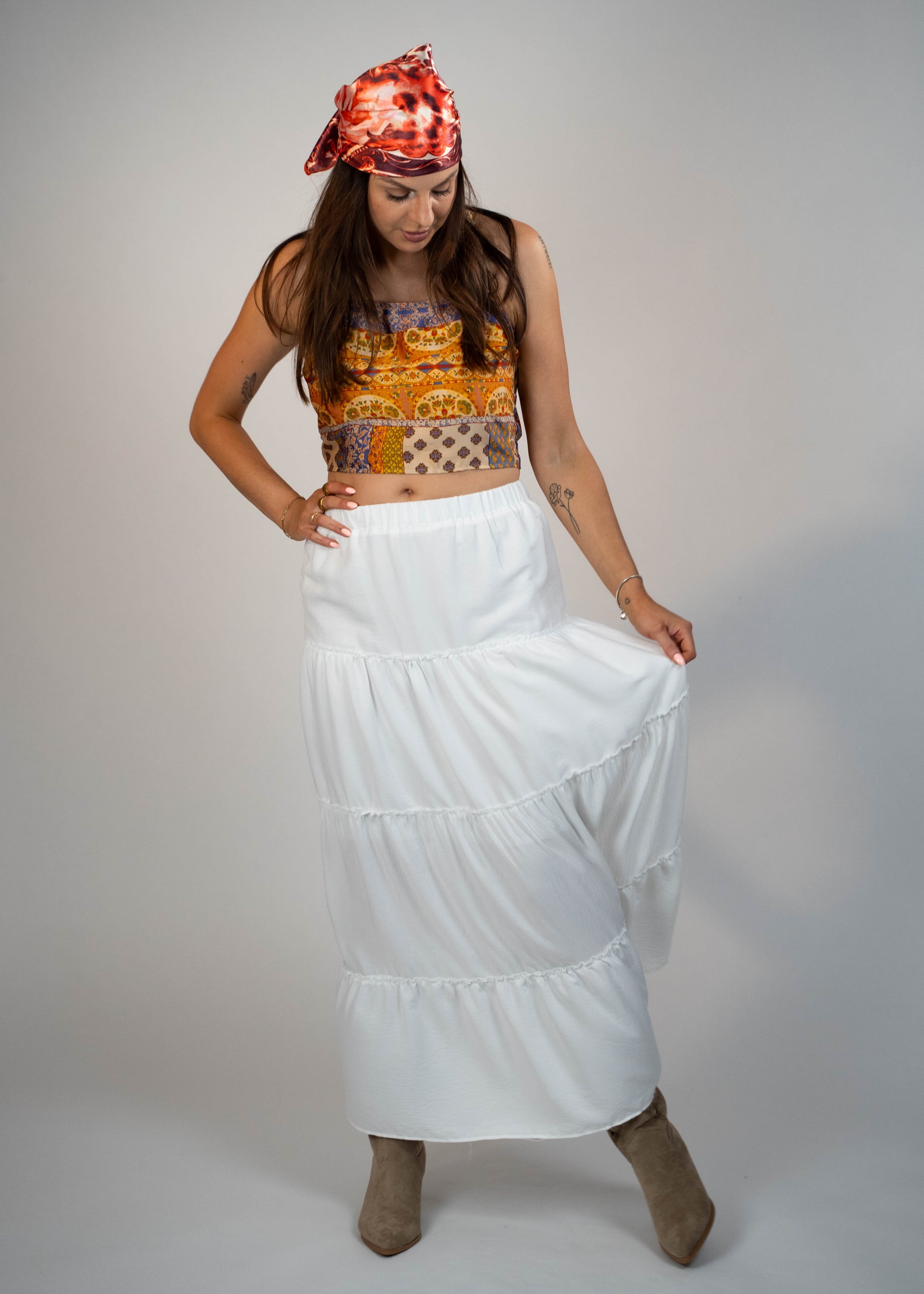 Popular maxi white skirt for this year, offering a timeless and elegant look. Perfect for creating versatile and stylish outfits
