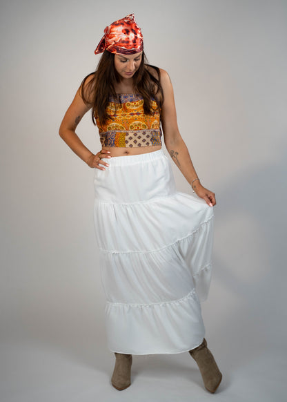 Popular maxi white skirt for this year, offering a timeless and elegant look. Perfect for creating versatile and stylish outfits