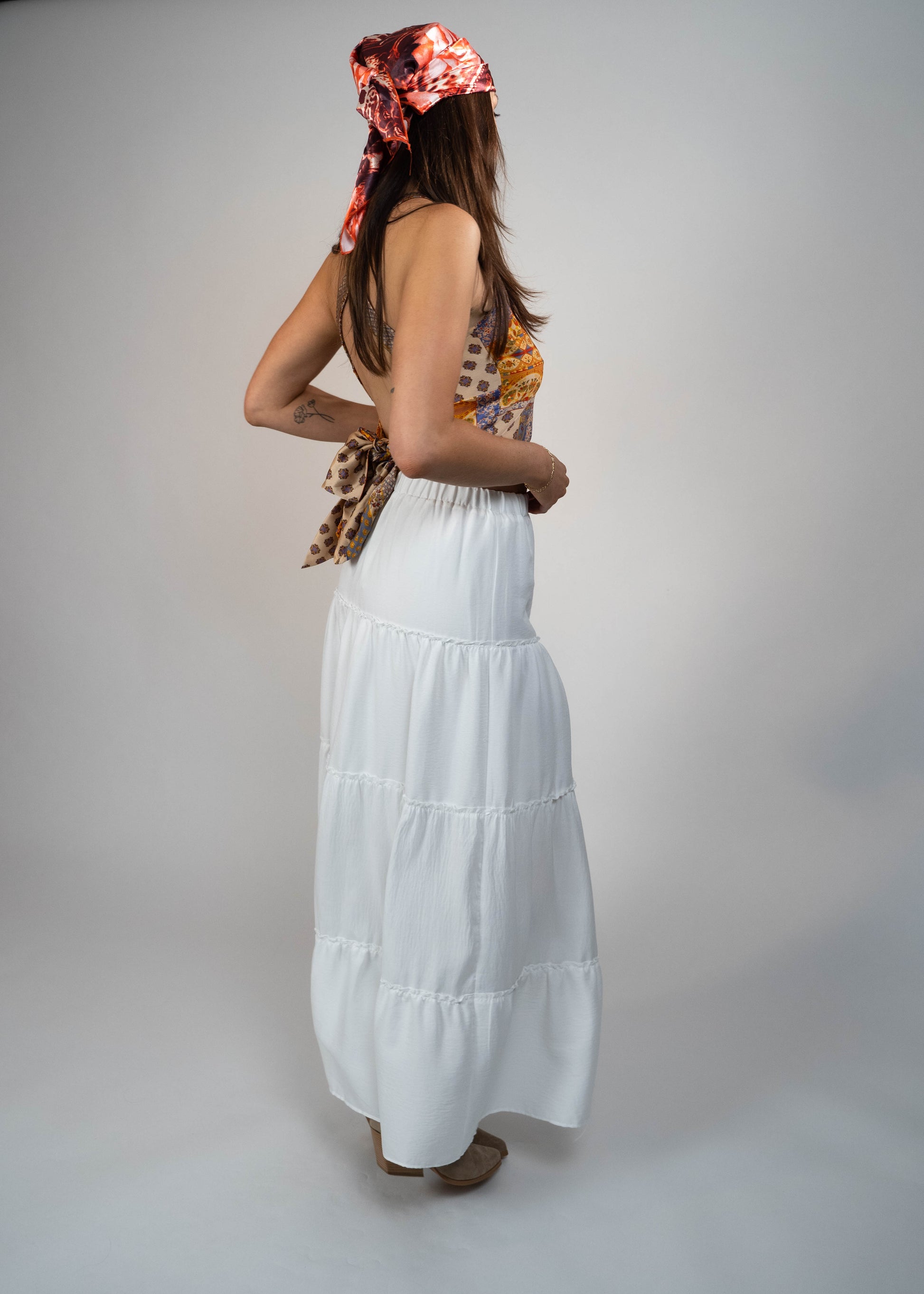 Popular maxi white skirt for this year, offering a timeless and elegant look. Perfect for creating versatile and stylish outfits