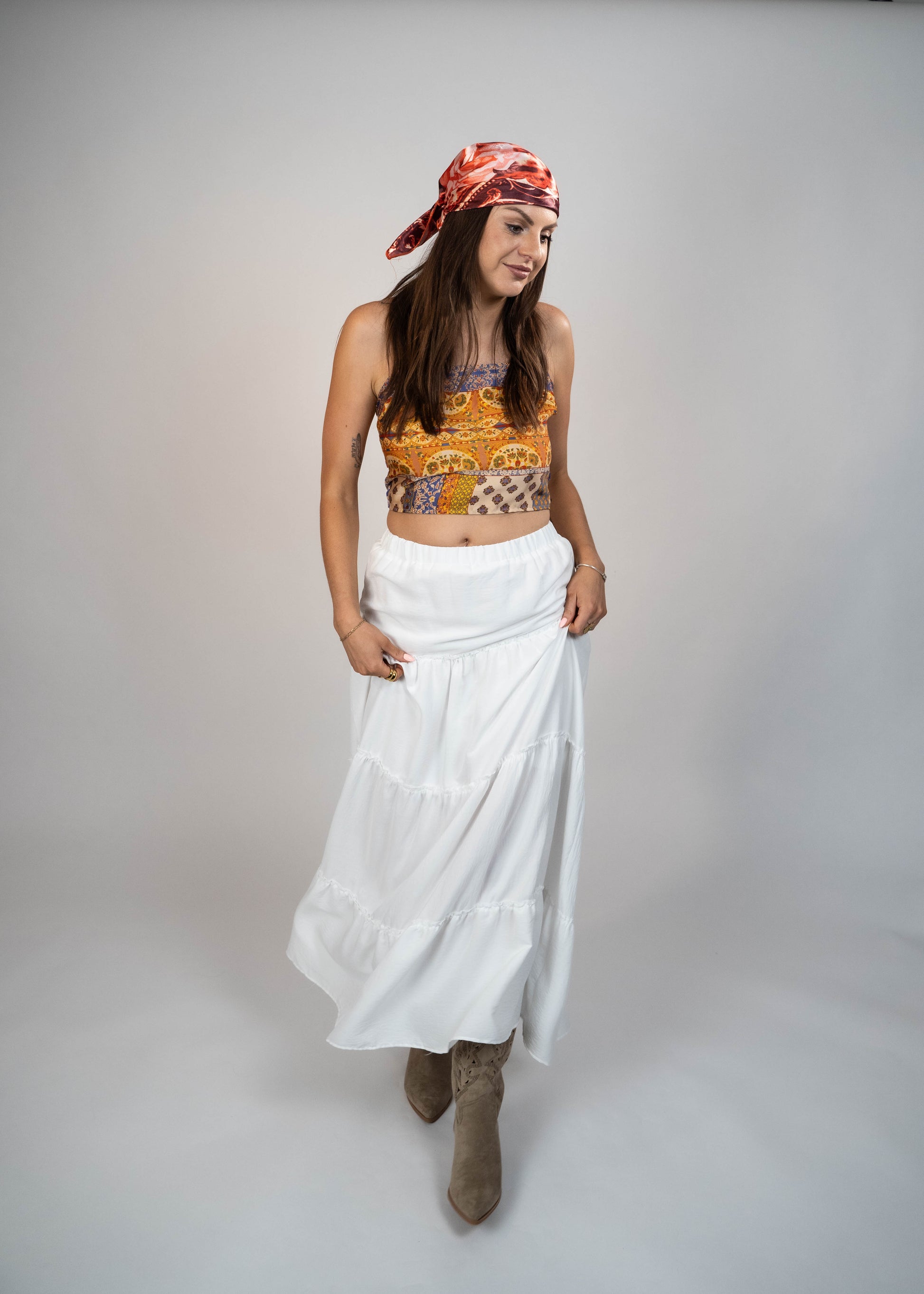 Popular maxi white skirt for this year, offering a timeless and elegant look. Perfect for creating versatile and stylish outfits