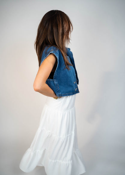 Blue loose-fit denim vest with structured shoulders, perfect for adding a relaxed and casual touch to any outfit
