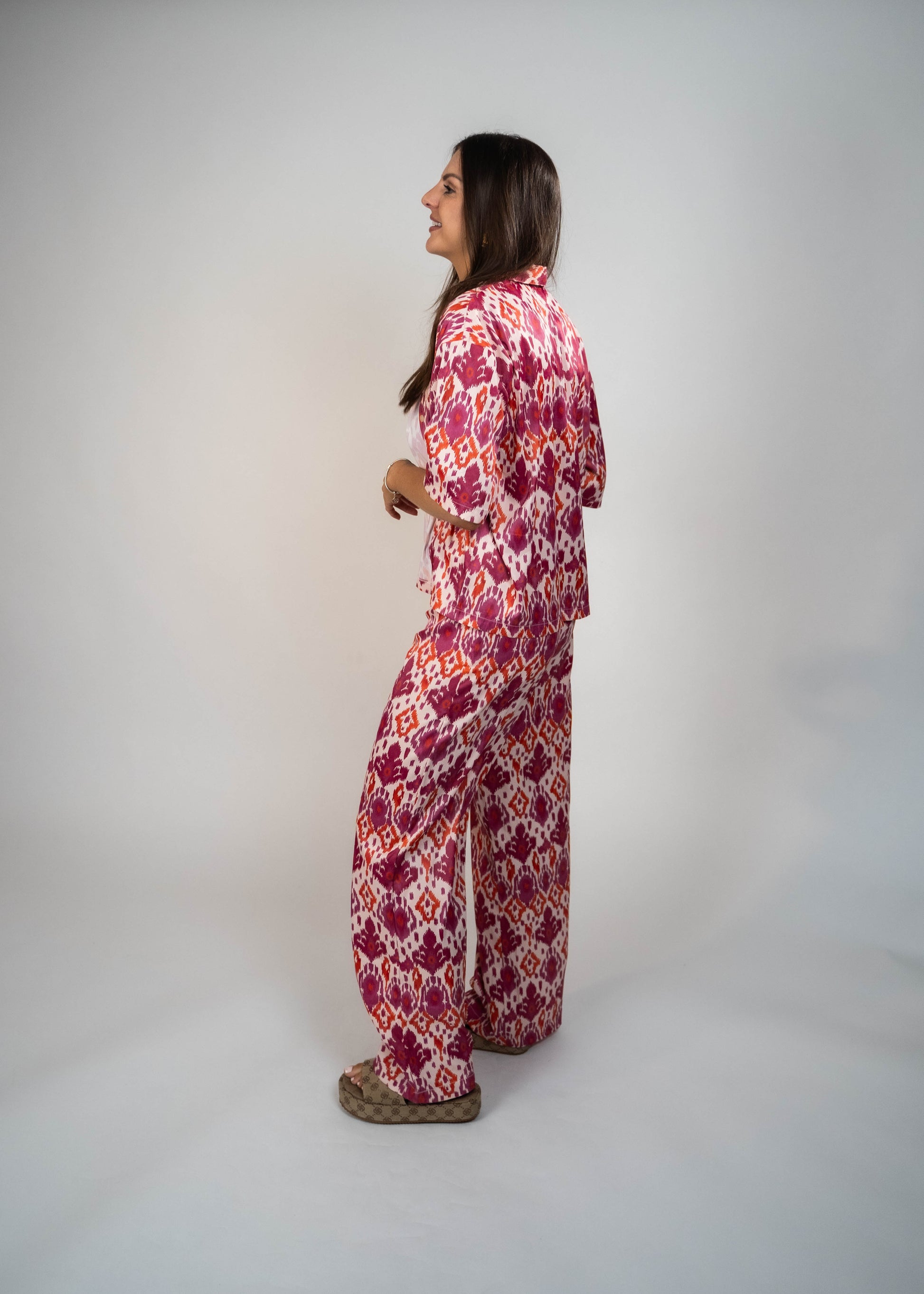 Hot pink Satin Shirt, expertly crafted for summer. Soft satin with a stylish pattern, buttondown featuring a classic collar and buttons. Elevate your summer style with this comfortable and stunning shirt