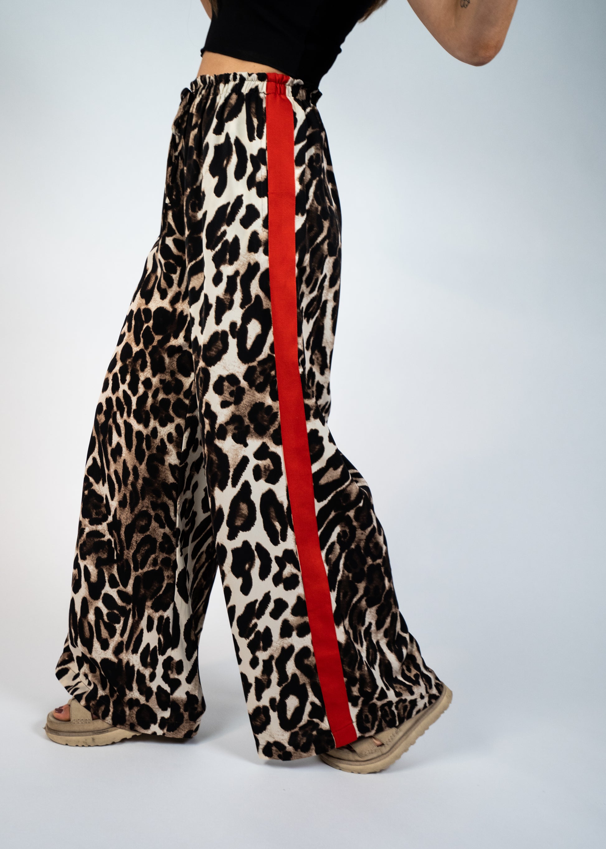 leopard pants with red stripes on the side