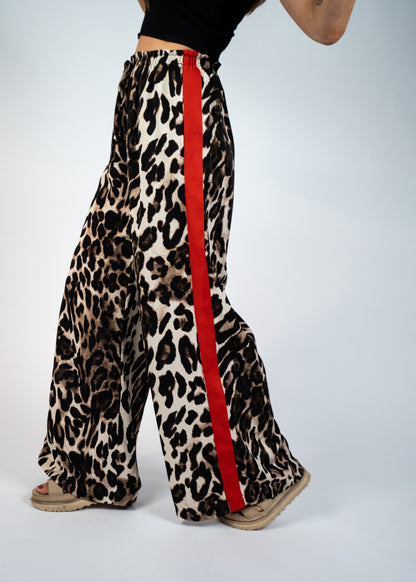 leopard pants with red stripes on the side