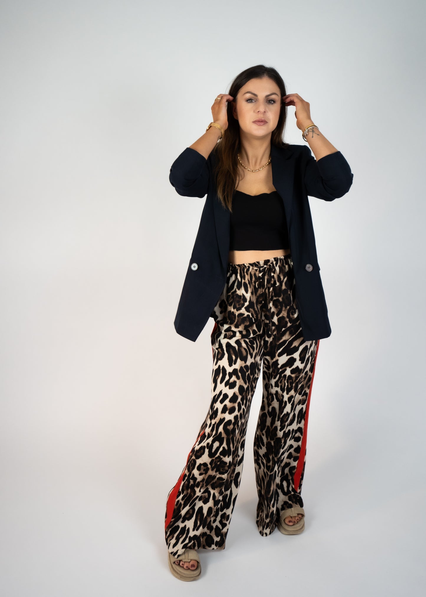 leopard pants with red stripes on the side
